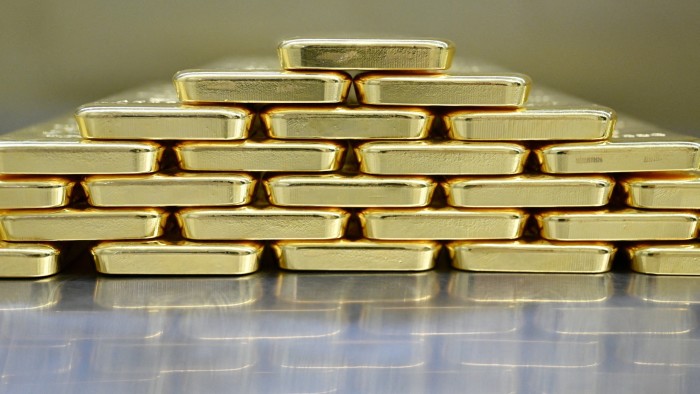 Gold bars stacked in the safe deposit boxes room of the Pro Aurum gold house in Munich, Germany