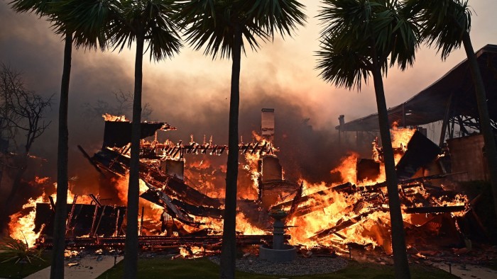 A home burns during the Palisades Fire in Pacific Palisades, California