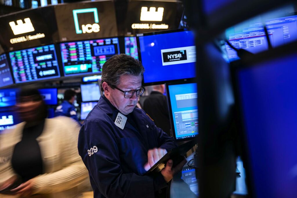 Dow falls, Nasdaq pops as Trump's latest tariff moves spark volatile trading