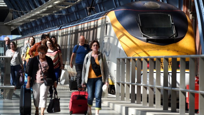 Passengers on a platform at the Eurostar terminal at St Pancras station in London