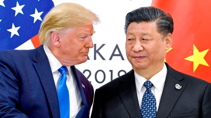 (L-R) Presidents Donald Trump and Xi Jinping at the G20 summit in 2019
