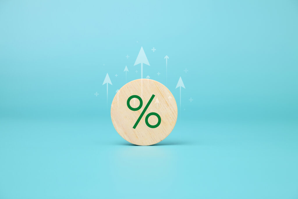 Rendering of a percent sign with up arrows above it