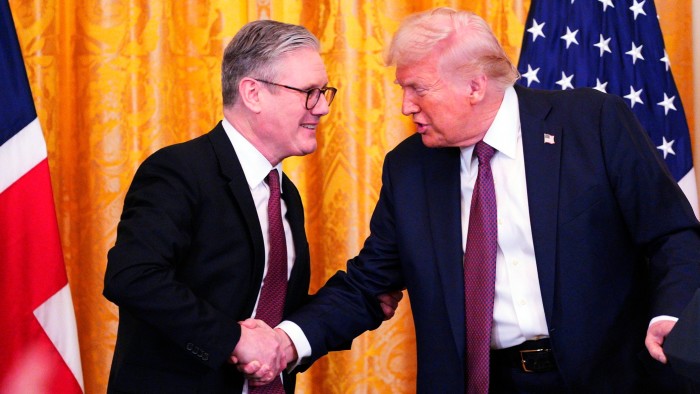 Britain’s Prime Minister Keir Starmer, left, and US President Donald Trump shake hands at a joint press conference in the East Room at the White House on February 27