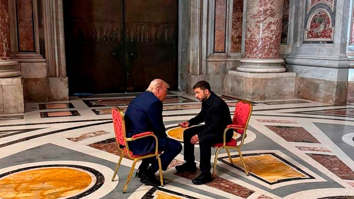 Volodymyr Zelenskyy, right, and Donald Trump, talk as they attend the funeral of Pope Francis in the Vatican on Saturday