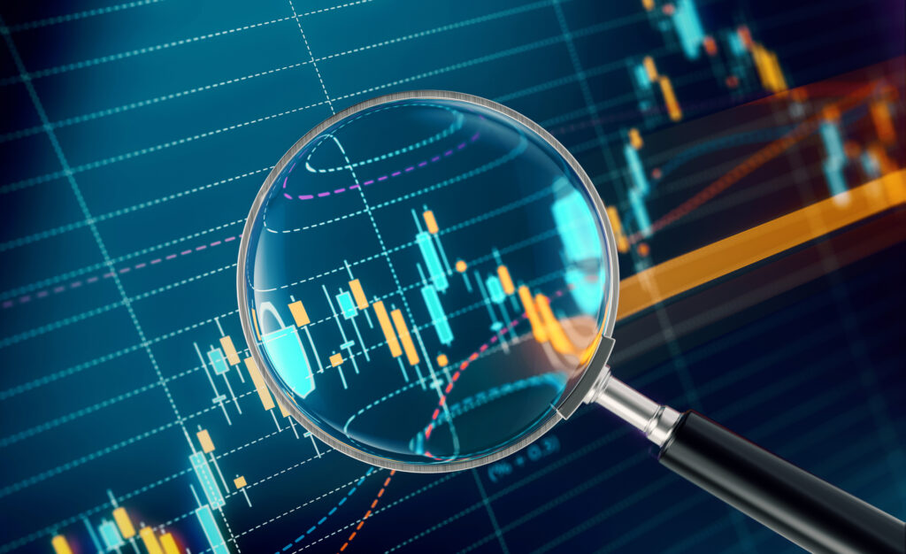 magnifying glass over stock chart
