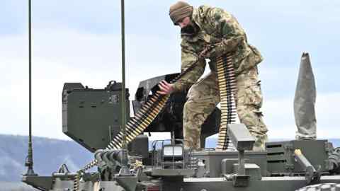 A soldier replenishes ammunition in a fighting vehicle during the EU’s Milex exercise in Hungary. The economic backbone of efforts to rebuild European military capacity is exposed to tightening credit conditions
