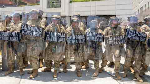 National Guard soldiers outside the Edward R. Roybal Federal Building