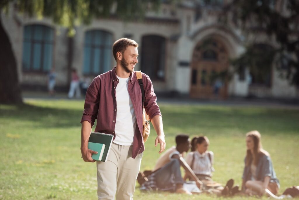 College Student Walking On Campus | Source: The College Investor