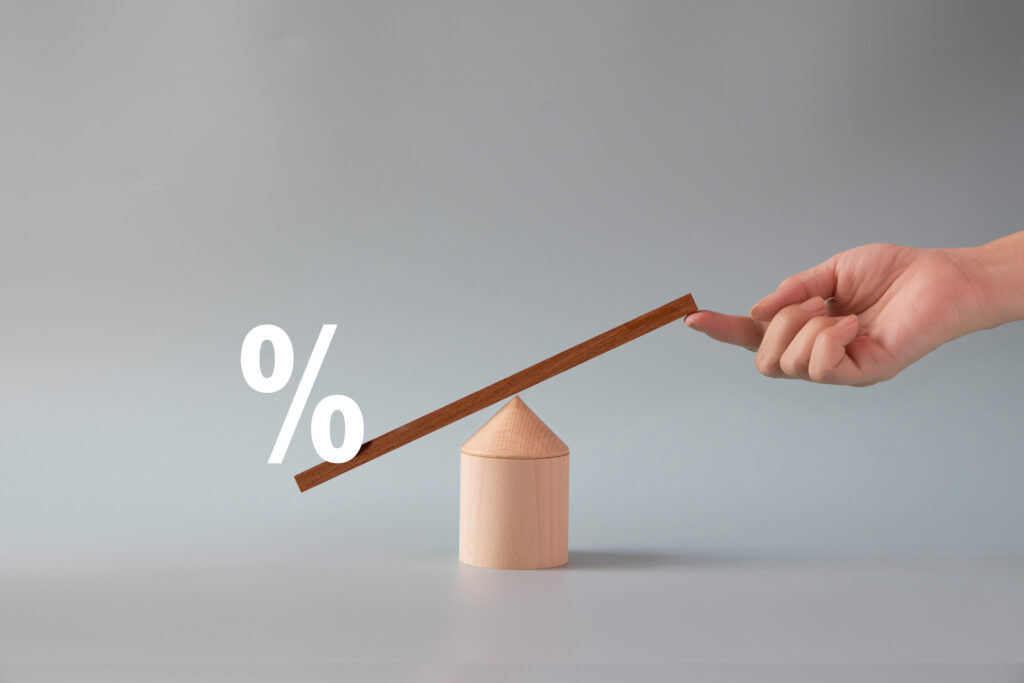 A scale with the percent symbol being lowered