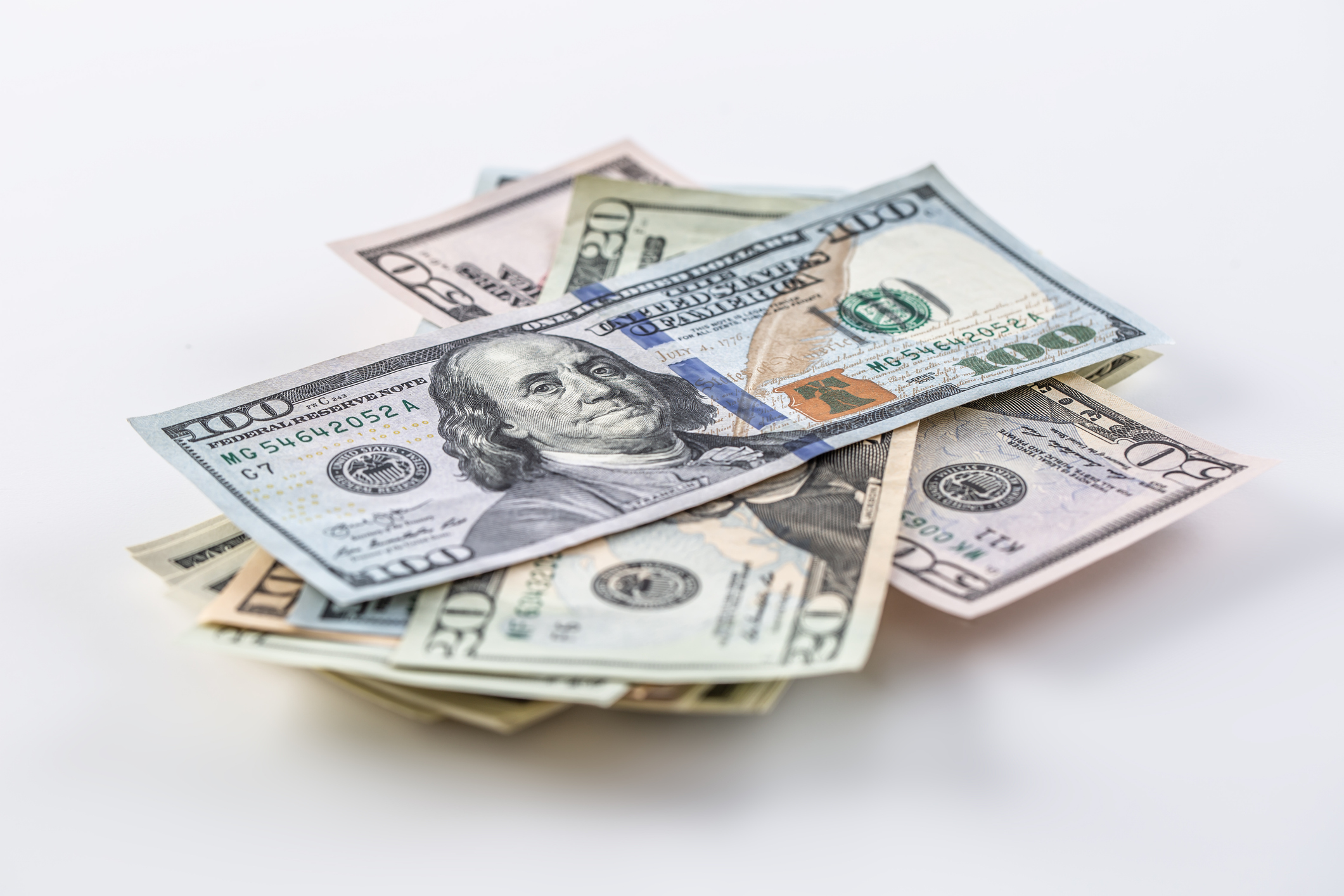 American banknotes on a white background.