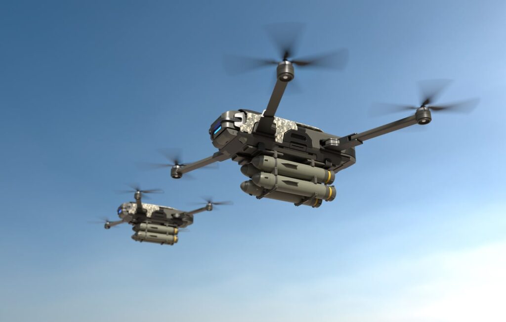 A pair of drones in the sky.