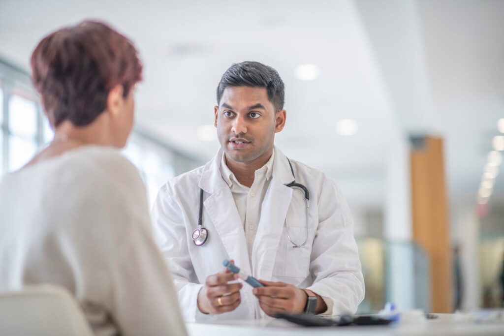 Doctor talking to patient.