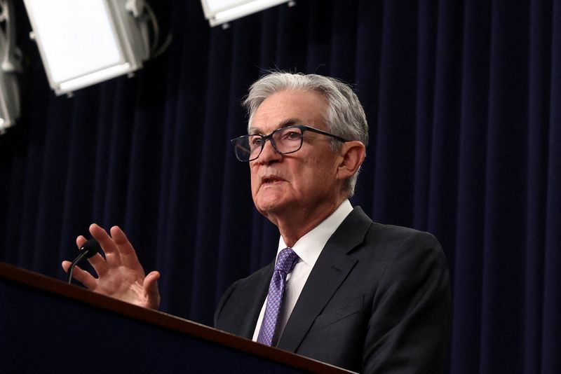 Investors react as Trump-Fed feud escalates