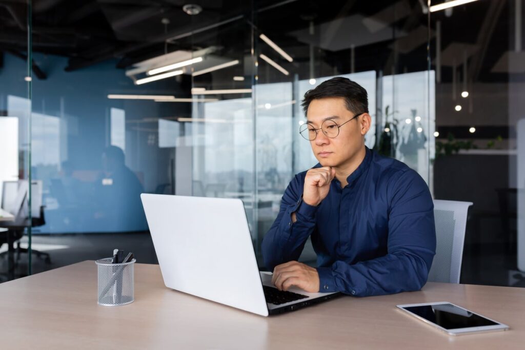 An investor thinking about buying a stock.