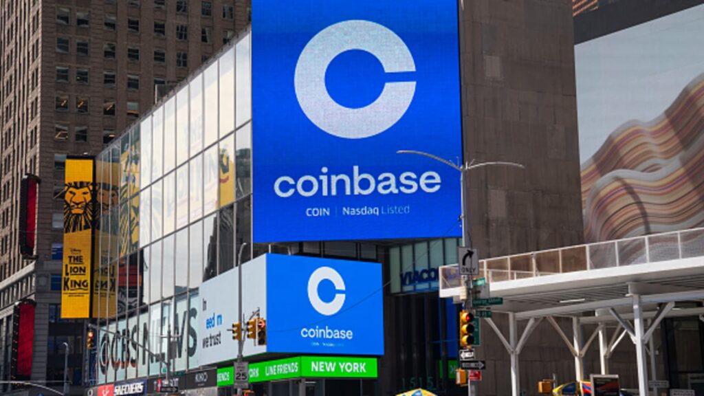 Coinbase cuts headcount by 14% citing AI acceleration