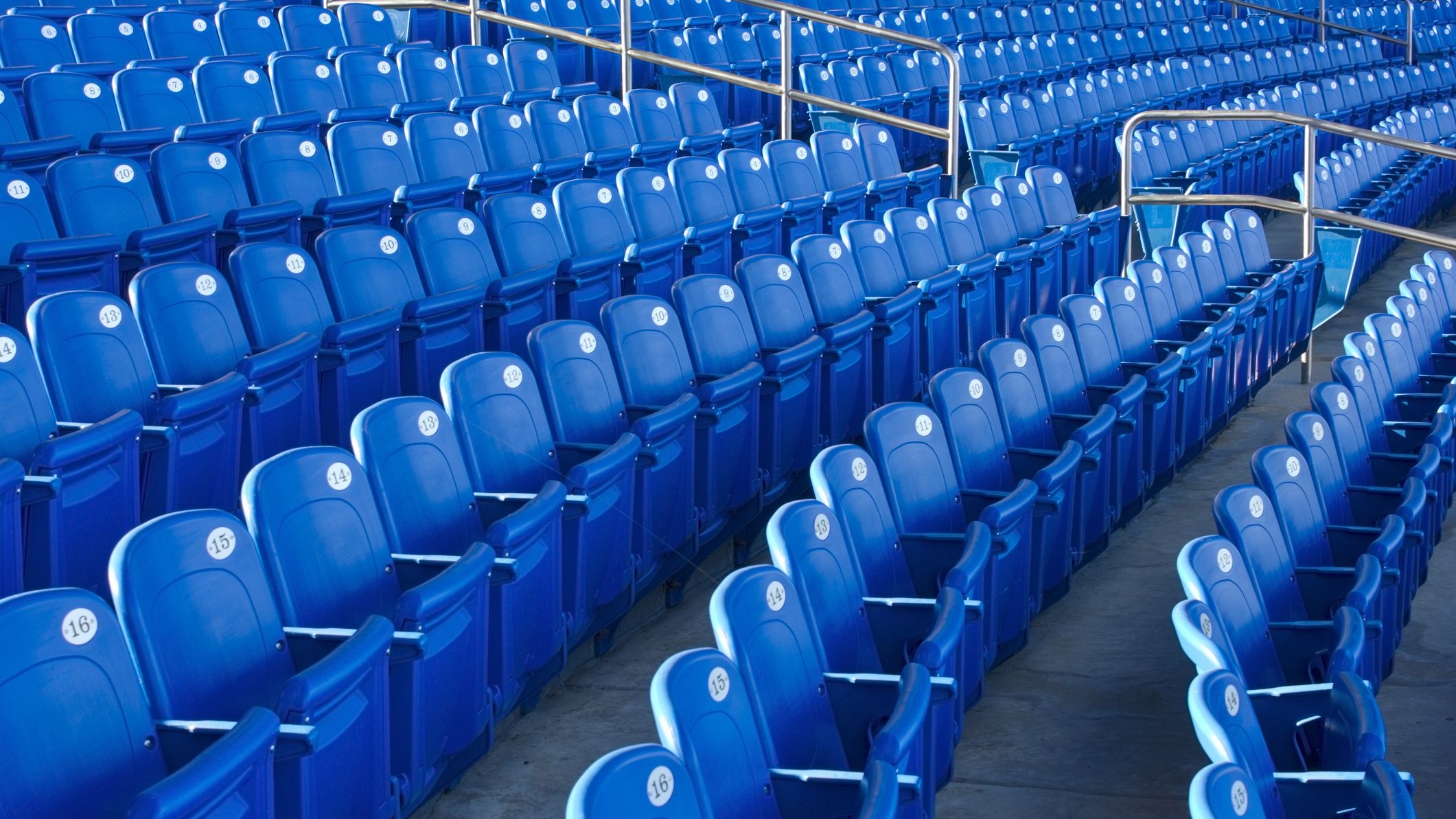 Empty blue seats at a stadium