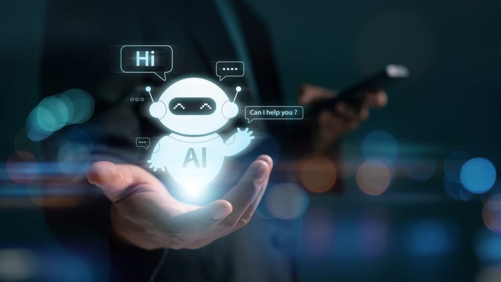 A person holding a figure of an AI robot.
