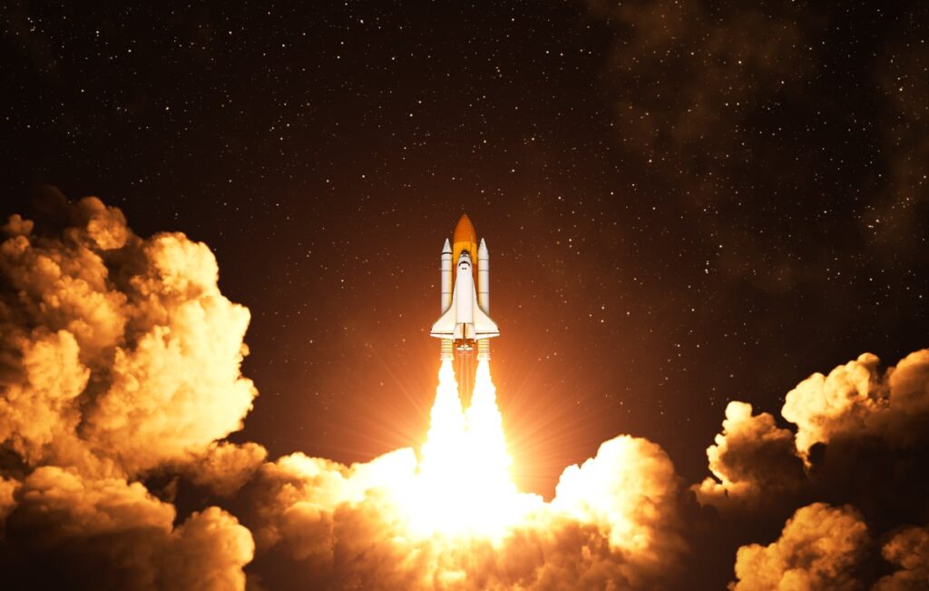 Rocket ship launching into outer space.