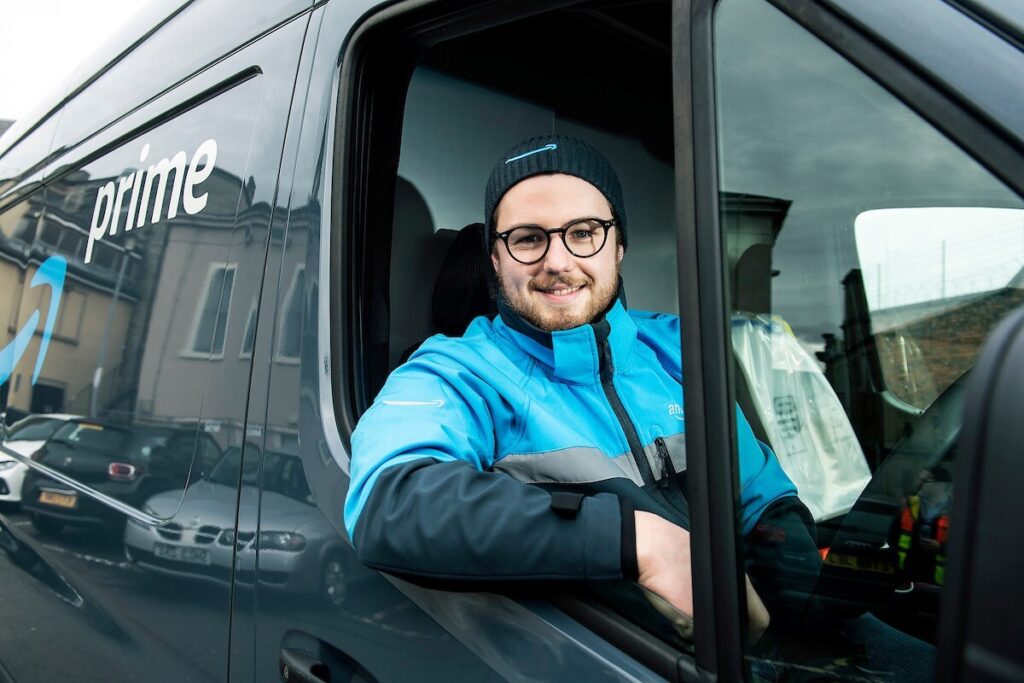 Amazon driver in a van.