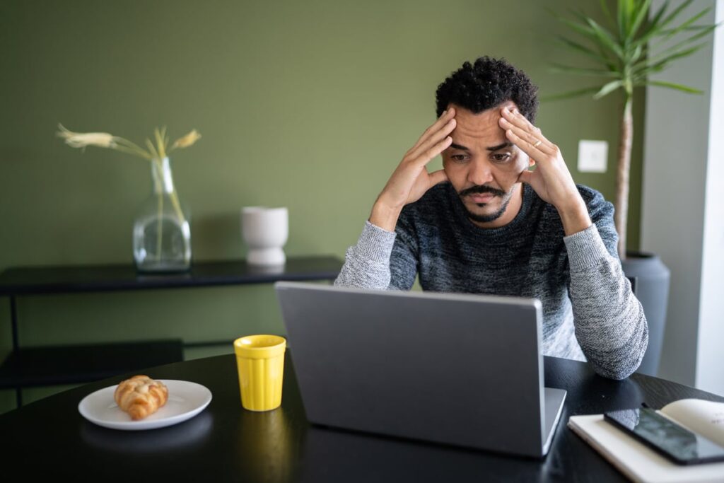 A person at a laptop.