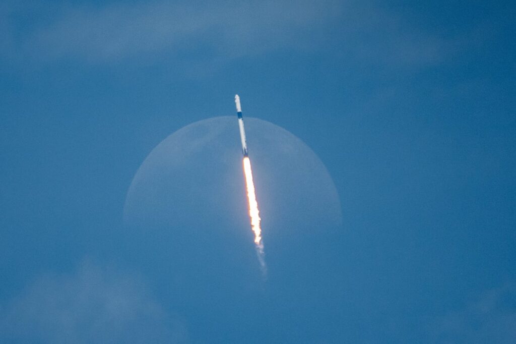 A rocket flying in the sky.