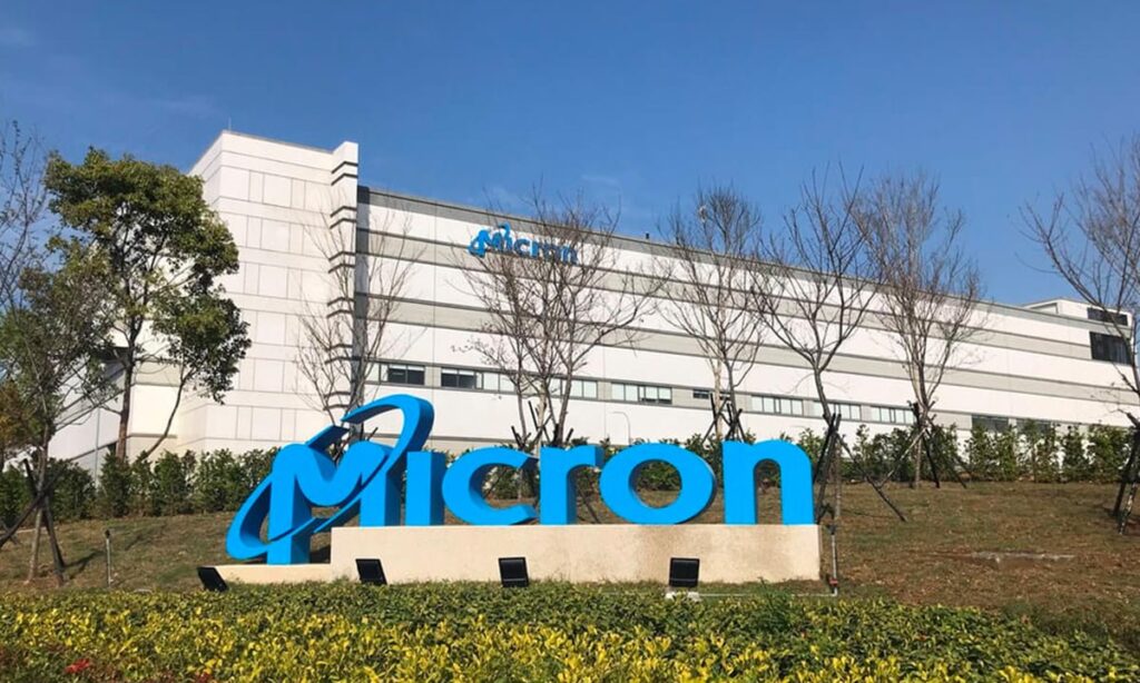Micron building with blue Micron sign out front.