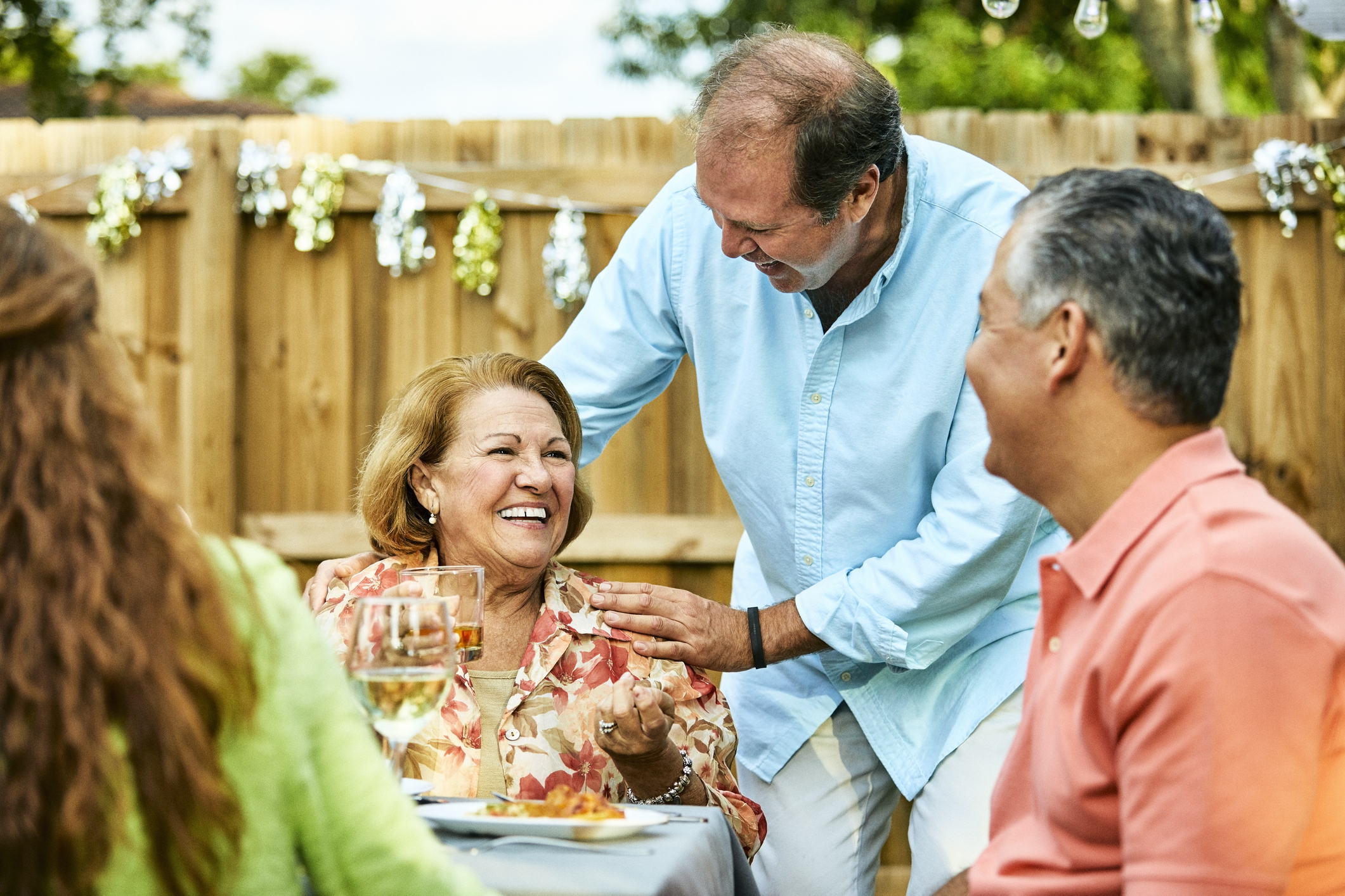 Women at a party in backyard