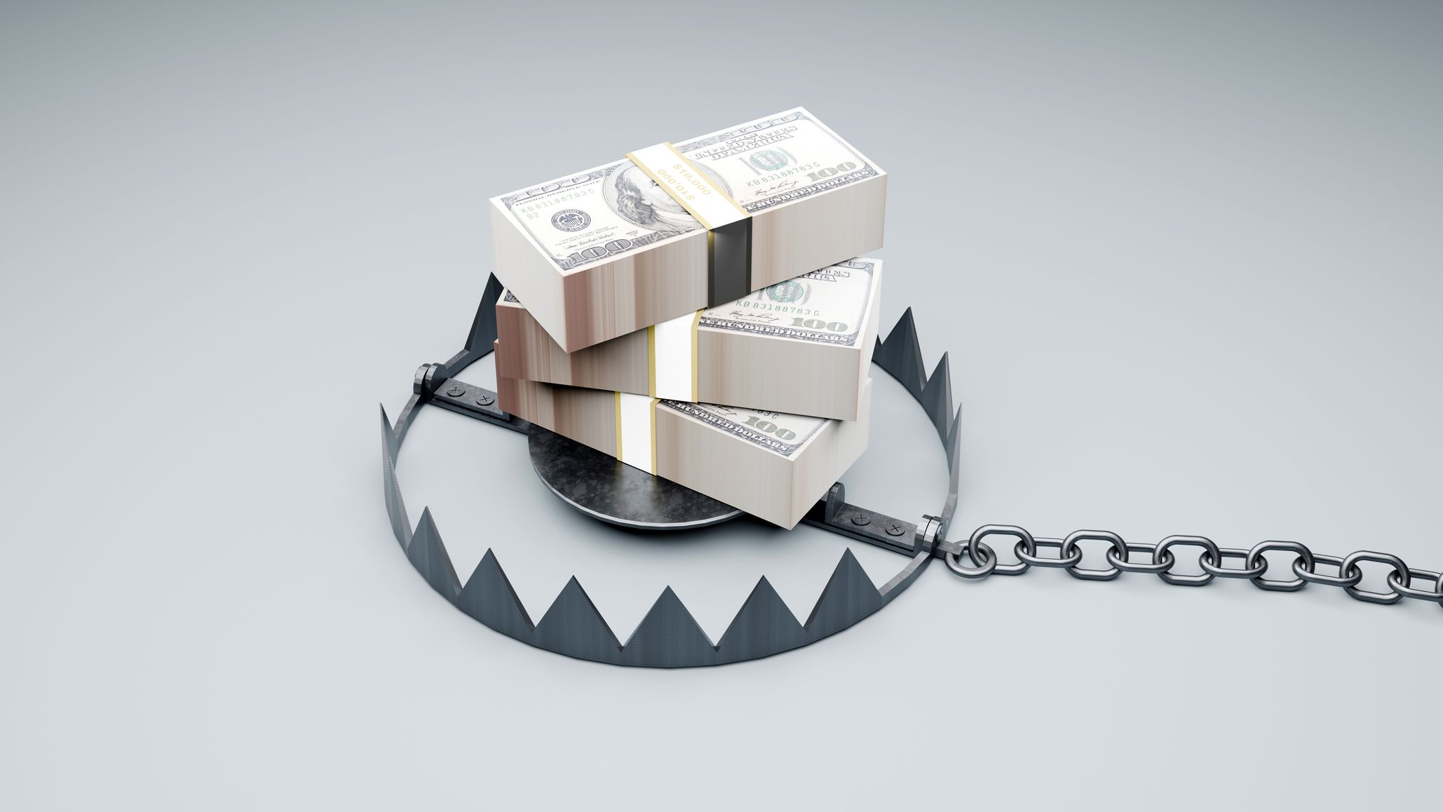 stacks of dollar bills laying inside a trap