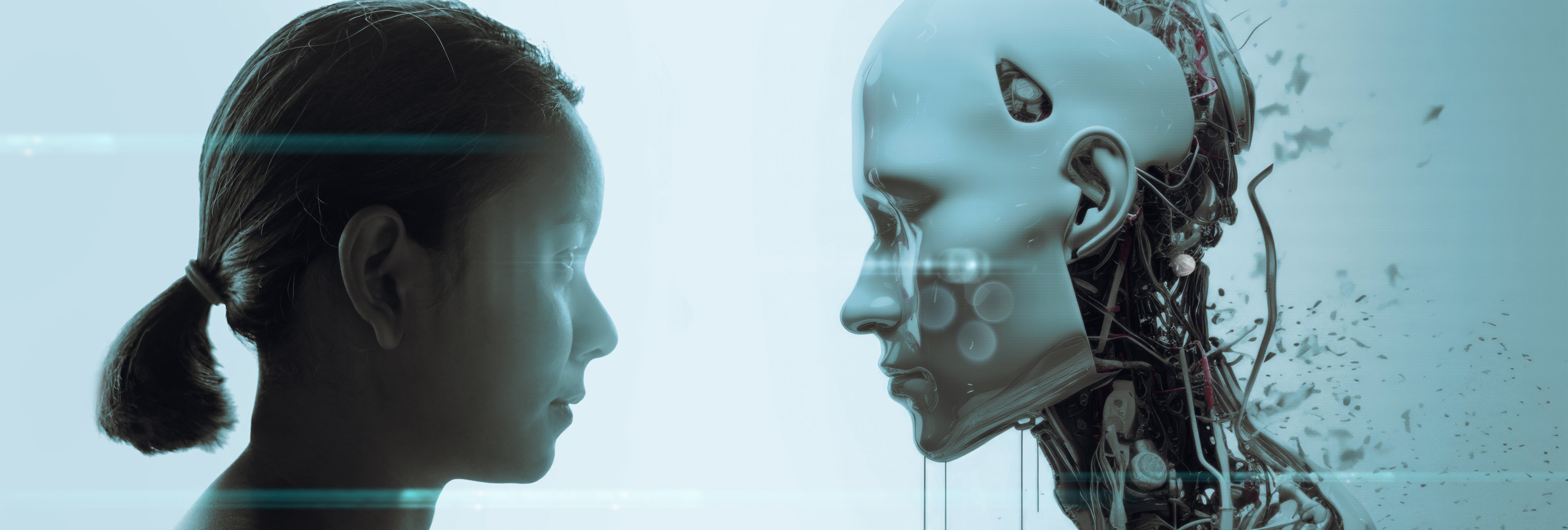 An individual looks face to face at a robot.