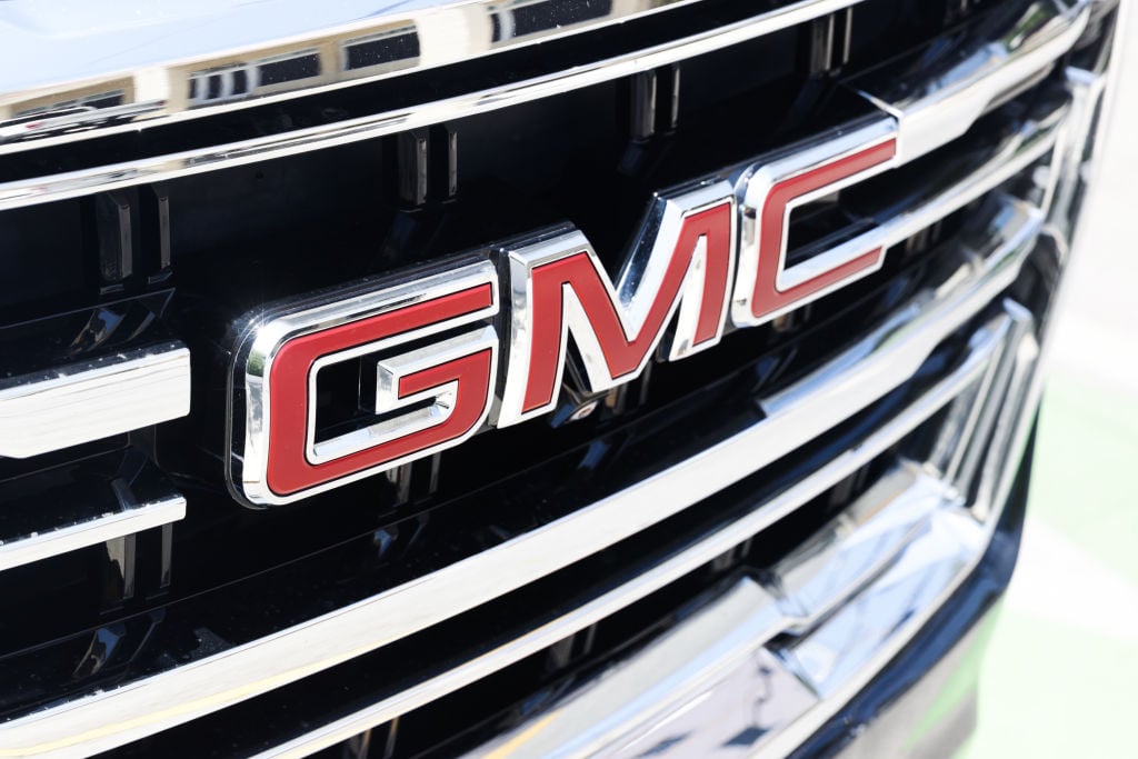 The GMC logo on a truck.