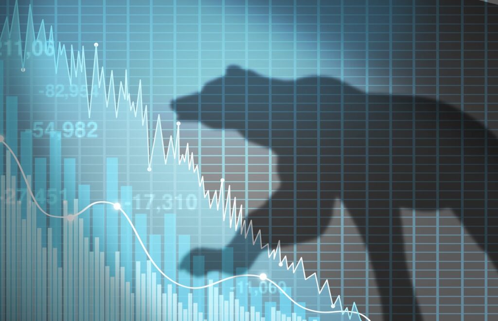 A silhouette of a bear over a stock chart.
