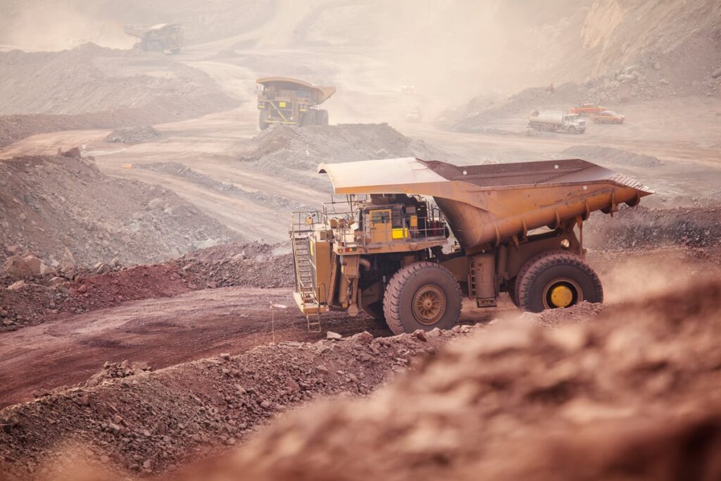 A mining truck sits in a copper mine.