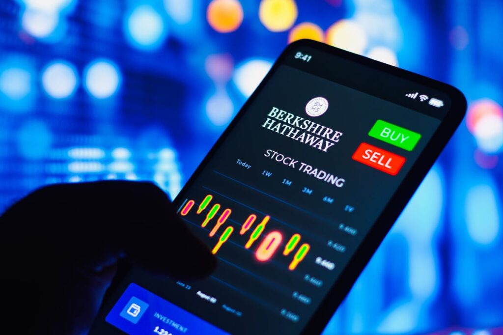 Person trading Berkshire Hathaway stock on mobile app.