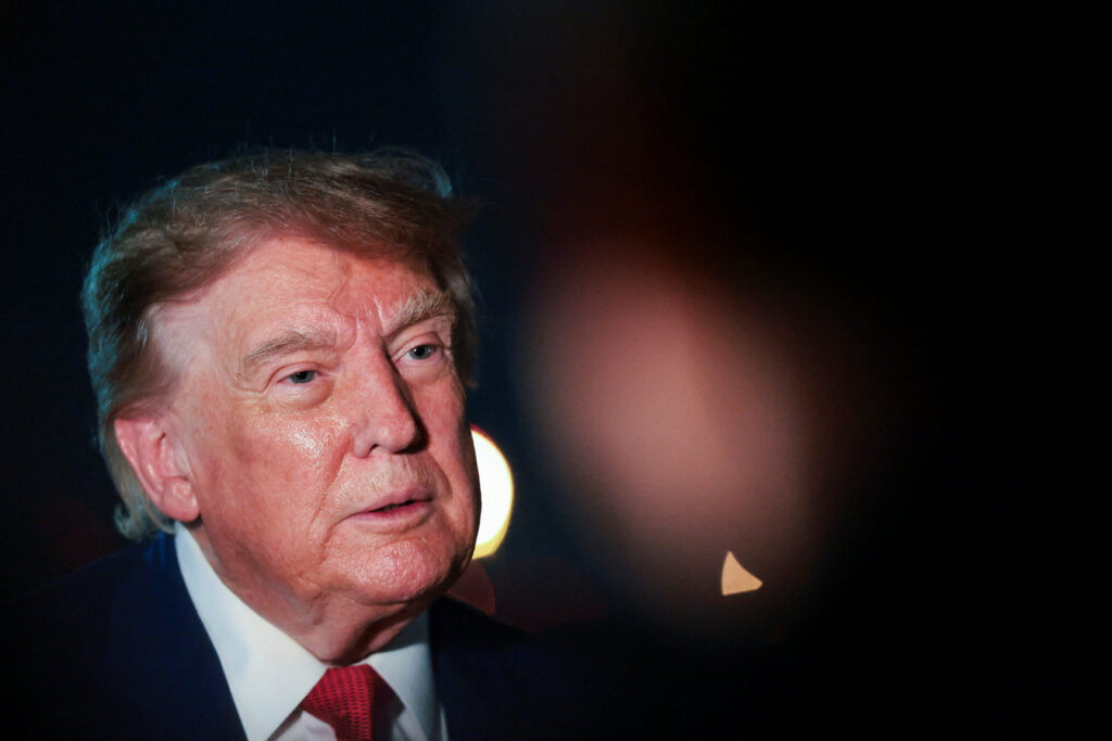 U.S. President Donald Trump looks on as he speaks to members of the media after disembarking Air Force One at Joint Base Andrews, Maryland, U.S., August 11, 2026. REUTERS/Kylie Cooper
