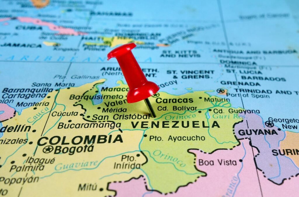A map with a red pin in Venezuela.