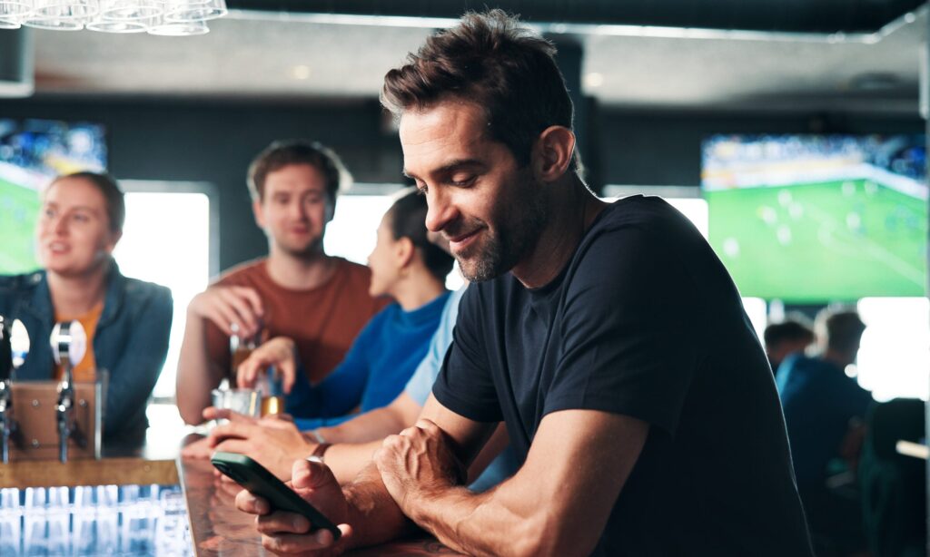 Mobile Sports Betting Is Booming — So Is the Debt That Comes With It