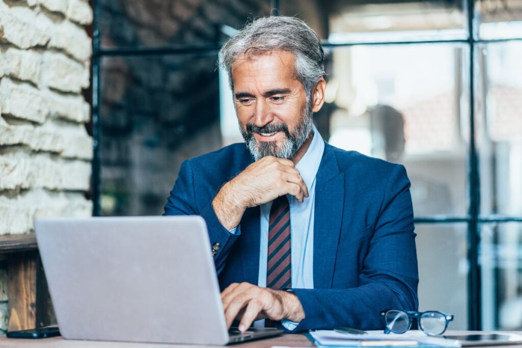 A person at a laptop.